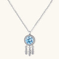 Sterling silver dreamcatcher pendant with blue moissanite center and three feather charms on adjustable chain.